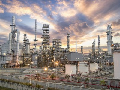 Oil and Gas Industrial zone,The equipment of oil refining,Close-up of industrial pipelines of an oil-refinery plant,Detail of oil pipeline with valves in large oil refinery.